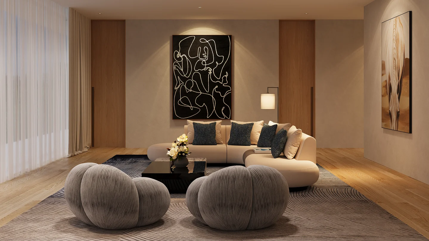 Elegant modern living room with a cream L-shaped sofa, two grey round armchairs, black coffee table, and abstract art.